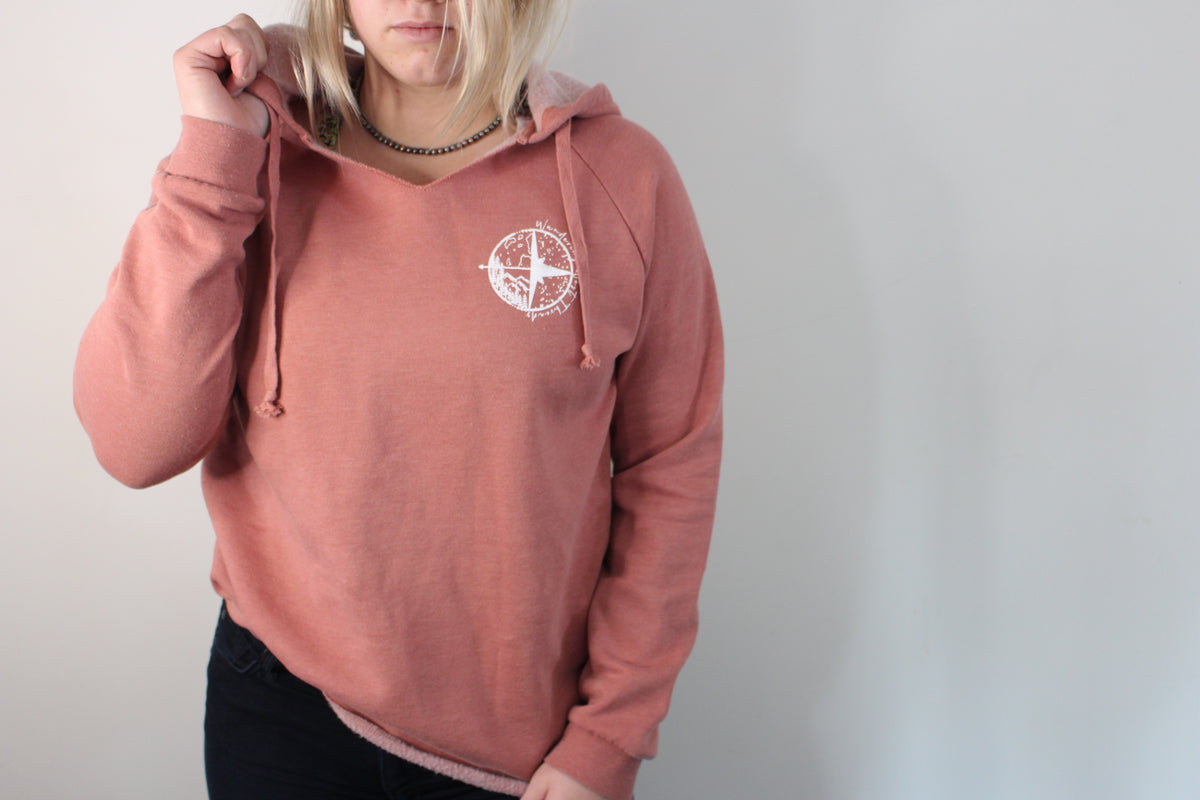 This lightweight blush pink hoodie in Medium, with our signature logo  is a must have!